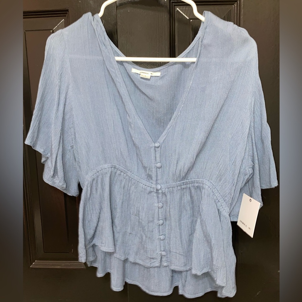 Light blue blouse. Runs small